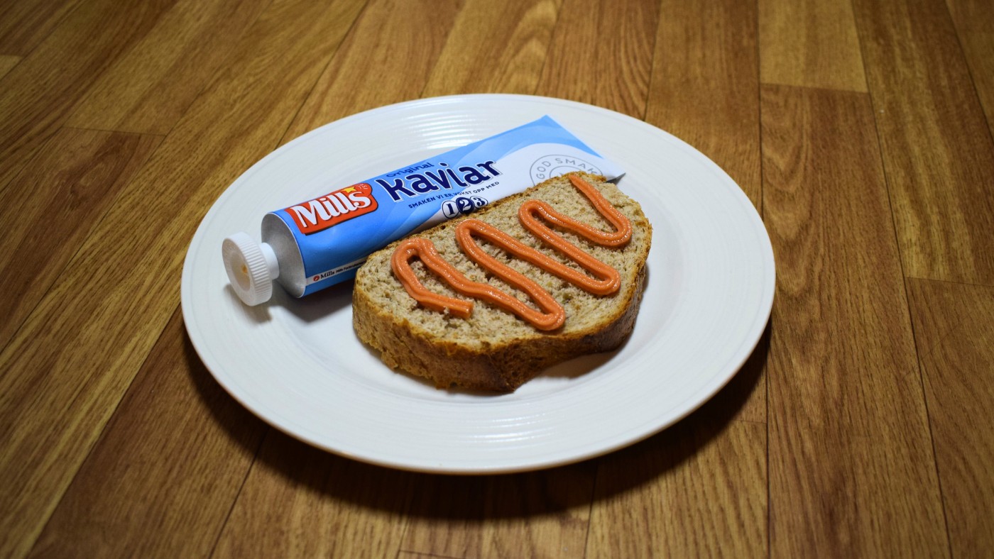 Tube of caviar and bread served in Norway. Photo: SiljeAO / Shutterstock.com.