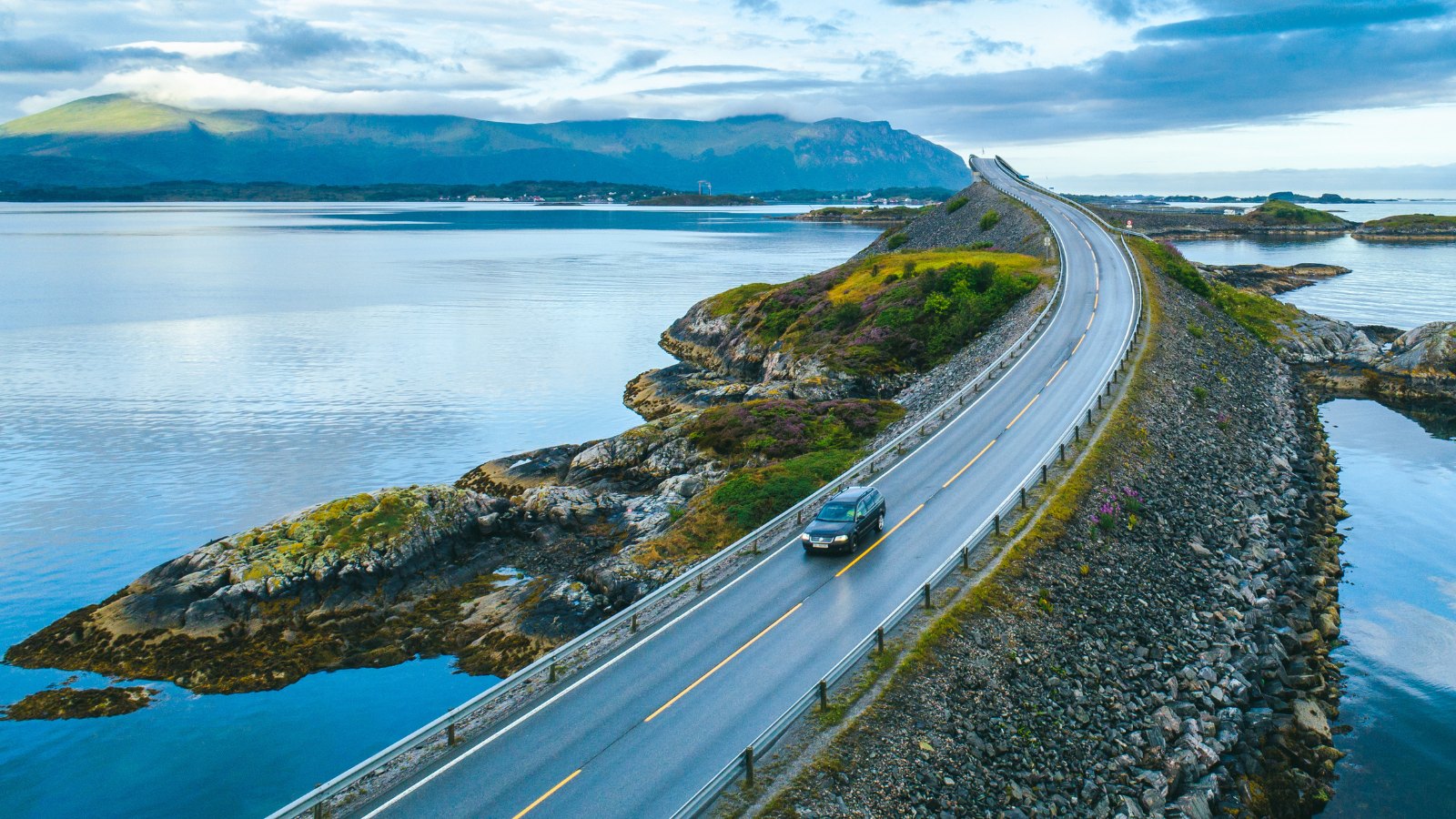 Car on the Atlantic Ocean Road in Norway.
